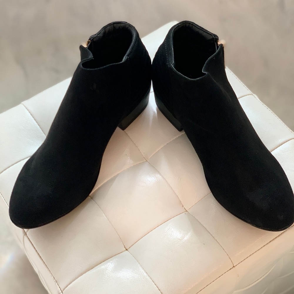 Black suede ankle boots.